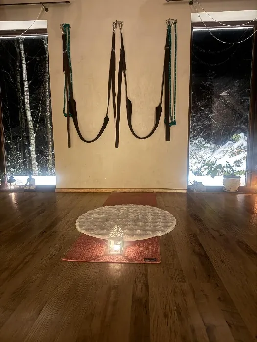 Yoga room with hammocks and candles